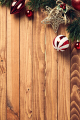 Fir branches with vintage Christmas ornaments corner border. Retro style Vertical banner design, poster template.