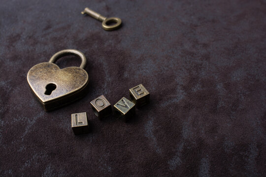 Love shaped padlock, key and love wording