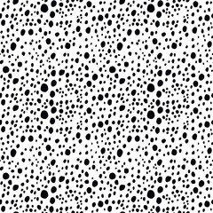 Abstract modern dalmatian fur seamless pattern. Animals trendy background. Black and white decorative vector illustration for print, card, postcard, fabric, textile. Modern ornament of stylized skin