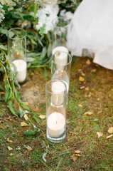 Candles, decor, wedding ceremony in the forest in nature