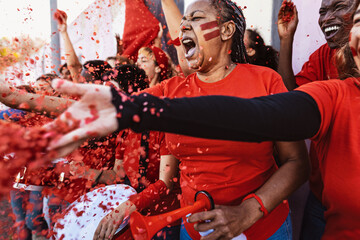 Football fans having fun supporting favorite team - Soccer sport entertainment concept