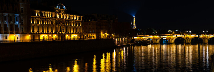 Fototapeta na wymiar Panorama. Evening Paris. View of the Pont Neuf and the Eiffel Tower.