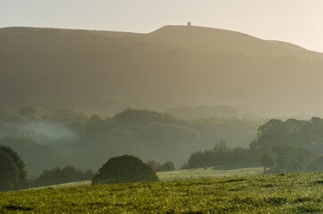 Rivington Pike in early morning Autumn Fall mist Winter Hill West Pennine Moors Lancashire England