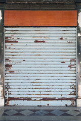 Old garage commercial business shop point roller door shutter texture background a long time ago...