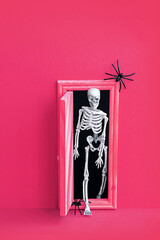 Skeleton go out the door. Halloween concept.
