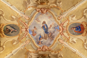 COURMAYEUR, ITALY - JULY 12, 2022: The ceiling fresco of Immaculate Conception in church Chiesa di San Pantaleone originaly by Giacomo Gnifetti from18. cent. and restored in1957 by Nino Pirlato. - obrazy, fototapety, plakaty