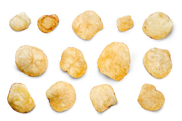 Viewed from above, a selection savoury potato chips, crisps, party food snacks isolated against a...