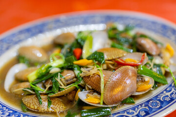 Pan fry clam with basil