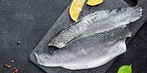 raw fish sea ​​bass fillet seafood snack on the table copy space food background