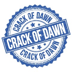 Fototapeta premium CRACK OF DAWN text on blue round stamp sign