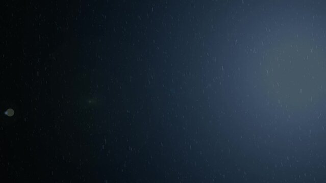 Snow background with glowing headlights
