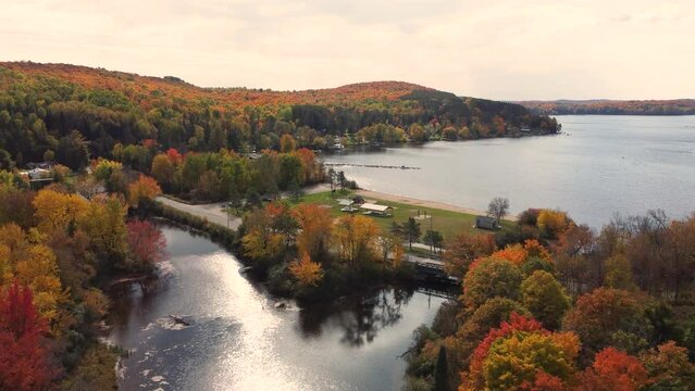 Aerial shot of campground beside river flowing inside Algonquin Provincial Park, Canada