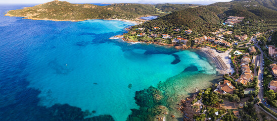 Sardegna (Sardinia) island aerial drone view of best beaches. Pevero beach near Porto Cervo in...