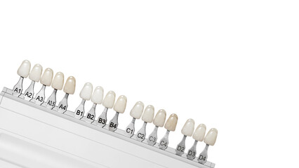 teeth color samples isolated on white background. Stomatology, whitening teeth, tooth implant, veneers, crowns, and dentures.
