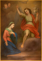 COURMAYEUR, ITALY - JULY 12, 2022: The painting of Annunciation in church Sanctuary of Notre Dame de Guerison by Giuseppe Stornone (1816 - 1890).