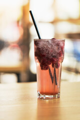 Glass of respberry lemonade isolated