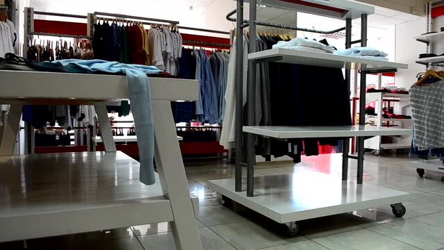 Clothes choice, shop. Racks with clothes