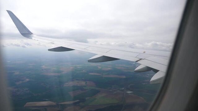 View from the window of the plane on the wing of the airliner. High quality 4k footage