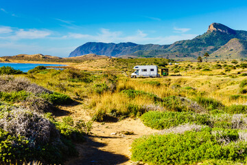 Fototapeta na wymiar Spanish coast with caravan camping in the distance
