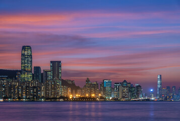 Fototapeta na wymiar Skyline of Victoria Harbor in Hong Kong city at dusk