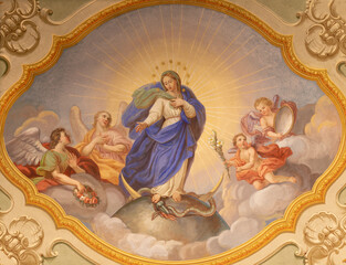 COURMAYEUR, ITALY - JULY 12, 2022: The ceiling fresco of Immaculate Conception in church in the...