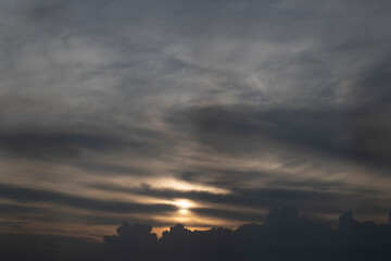 Grey sky and silhouette clouds with sunshine background. Beautiful landscape concept.