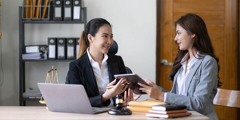 business people and lawyers discussing contract papers sitting at the table. Concepts of law, advice, legal services, legal and judgment concept