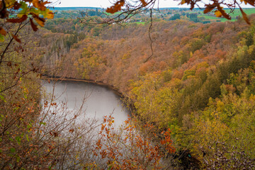 High angle panorama view on the landscape of Parc naturel des deux Ourthes during autumn in the Ardennes of Wallnia, Belgium.