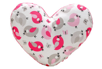 Heart-shaped pillow fabric with a pattern of birds isolated on a white background