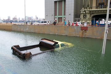 The Department of Transportation truck that became one of the most symbolic examples of impact of Hurricane Sandy sits flooded by the residual storm surge in the Battery Underpass on Oct 31st 2012