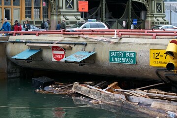 Looking south into the entrance of the Battery Park Underpass flooded by the residual waters of...