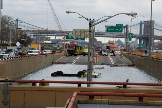 The Department of Transportation truck that became one of the most symbolic examples of impact of Hurricane Sandy sits flooded by the residual storm surge in the Battery Underpass on Oct 31st 2012