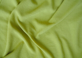 Fabric texture of natural cotton, wool, silk or linen textile material. Green fabric background