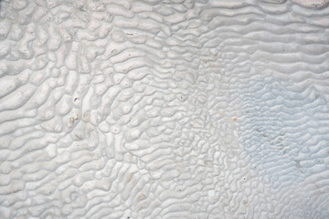White travertines, calcite cliff of Pamukkale in Turkey