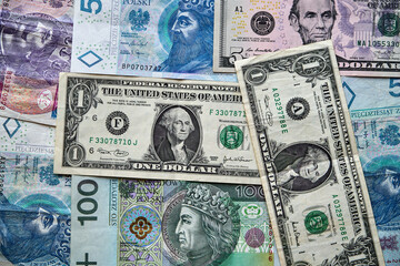 Fototapeta na wymiar polskie banknoty ,amerykański banknoty 