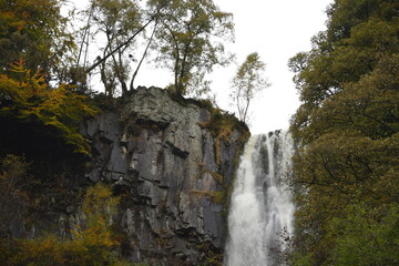the tall Pistyll Rhaeadr waterfall in north wales from the bottom of it