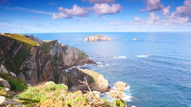 Seascape of Atlantic ocean and Asturias rocky coast at Cape Penas. Sea shore with high cliffs in north Spain.