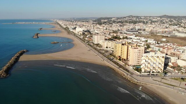 Aerial drone view of Playa de Cunit on sunny winter day, Tarragona, Spain