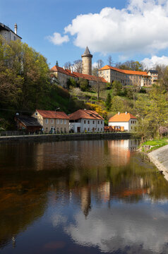 Czech Republic, South Bohemian Region, Rozmberk nad Vltavou, Vltava River canal with houses in background