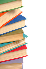 Bunch old battered multicolored hardcover books white background.