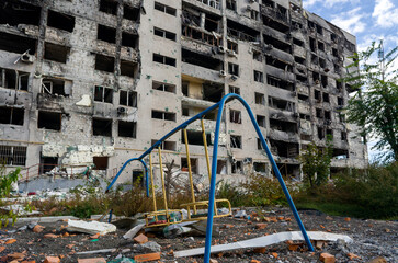 destroyed and burned houses in the city during the war in Ukraine