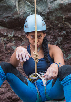 Hilarious rock climber in tank top ready to go with figure 8 knot
