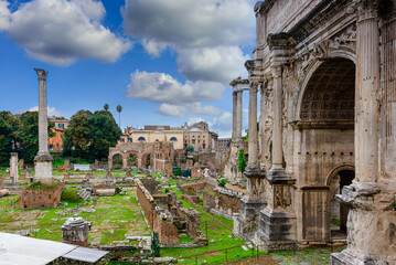 Night view of Temple of Saturn and Forum Romanum in Rome, Italy. Architecture and landmark of Rome....
