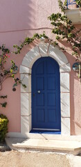 Fototapeta na wymiar Blue door in Asos, Kefalonia 