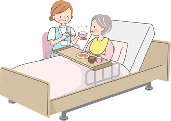 シニア女性に食事を介助する介護士