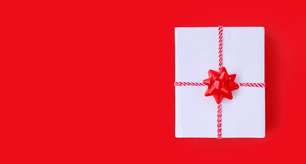 banner gift box on a red background top view with place for text	
