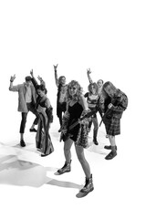 Naklejka premium Group of stylish expressive people, man and woman, performers posing over white background. Rock and roll era, 50s