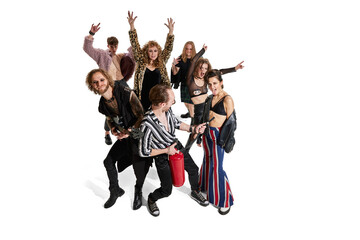 Group of stylish expressive people, man and woman, rock music performers posing over white background. Top view