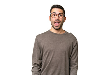 Young handsome caucasian man over isolated background with surprise facial expression