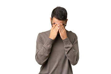 Young handsome caucasian man over isolated background with tired and sick expression